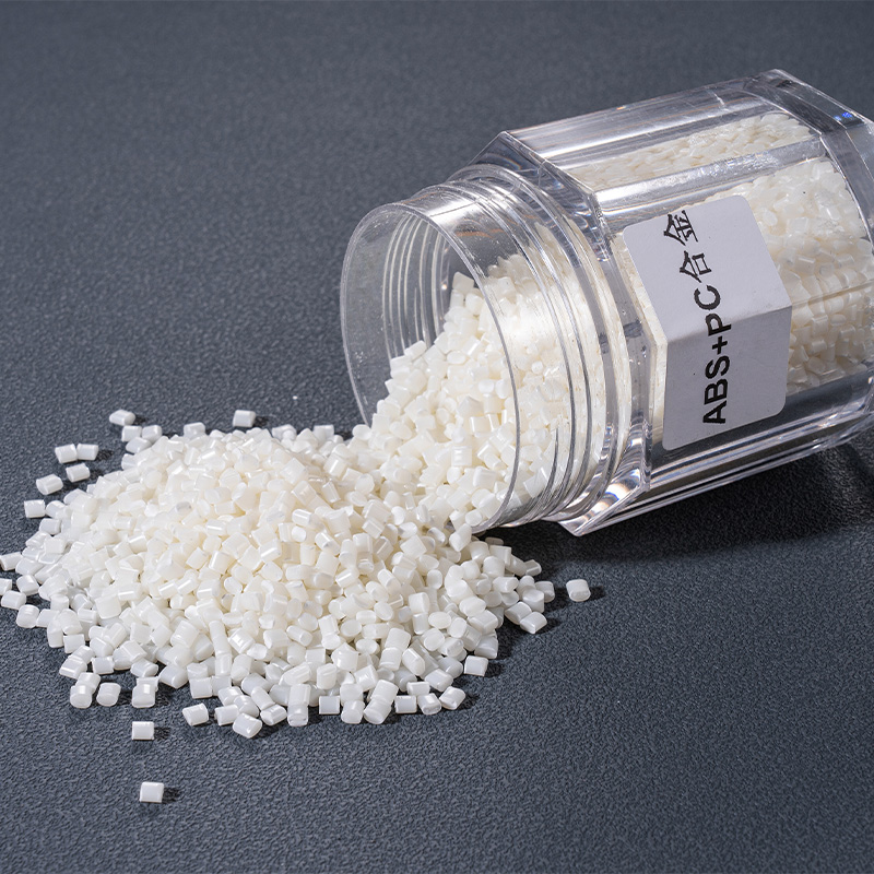 Natural ABS plastic pellets ready for custom injection molding at Zhongrongda manufacturing facility